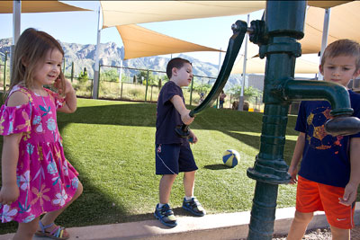 Students trying the water pump